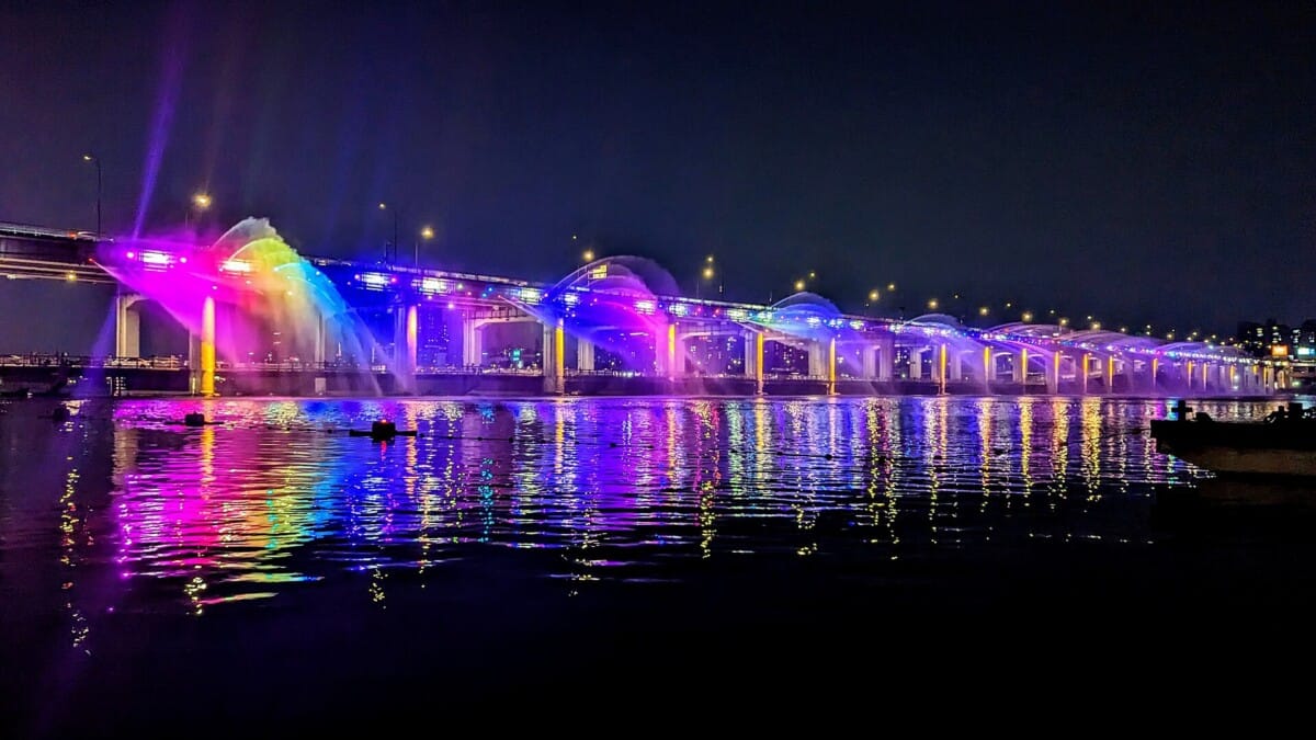 Banpo Hangang Park night view with Banpo Bridge lights reflecting on the Han River