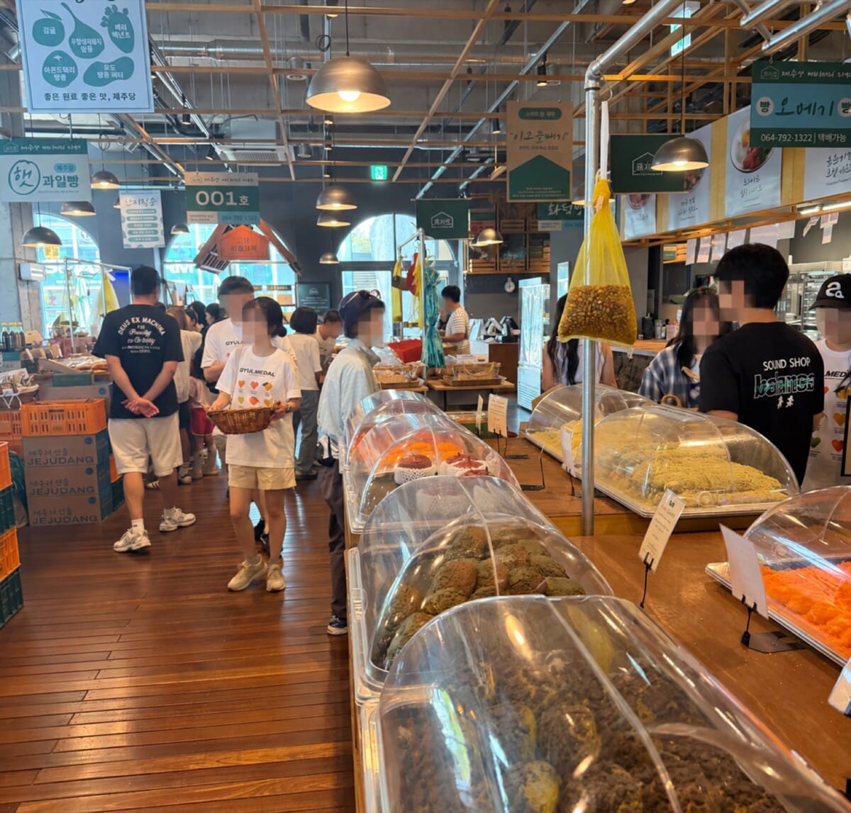 Large bakery display inside Jejudang Bakery Cafe in Aewol, Jeju Island