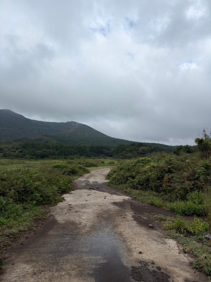 Wet approach road leading toward Nokkome Oreum in Jeju