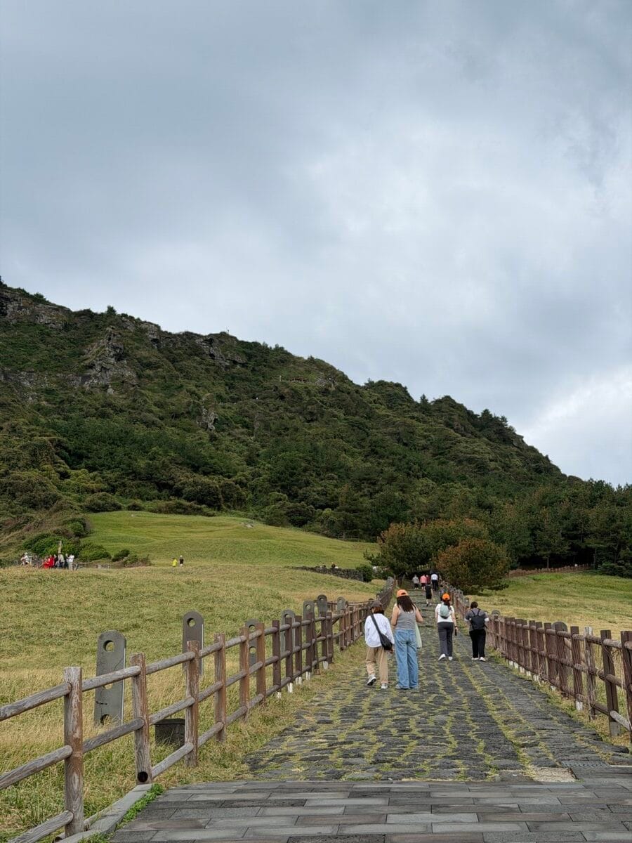 Walking path toward the Seongsan Ilchulbong summit trail