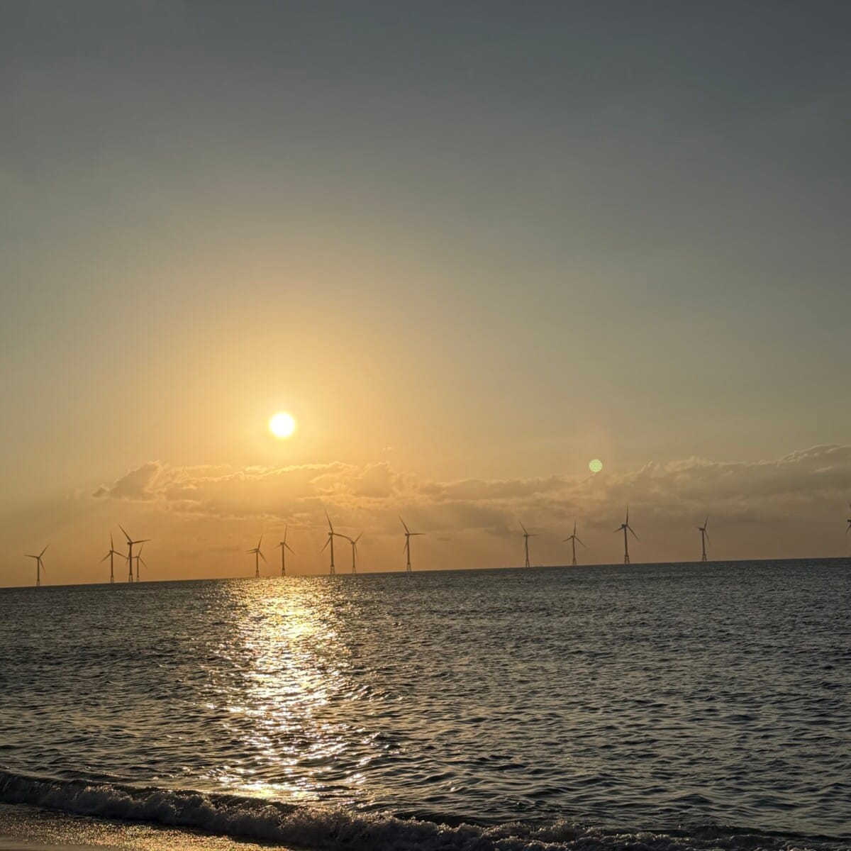 Sunset over the sea from the beach in front of my accommodation in Aewol, Jeju Island